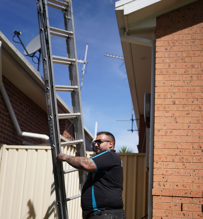 Technician on ladder